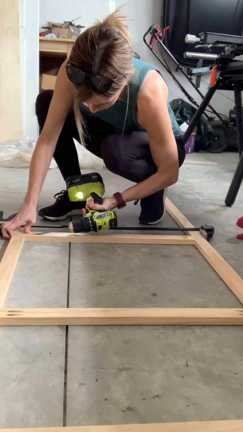 Melissa Tyler using pocket holes and a drill to assemble the face frames for her custom closet.