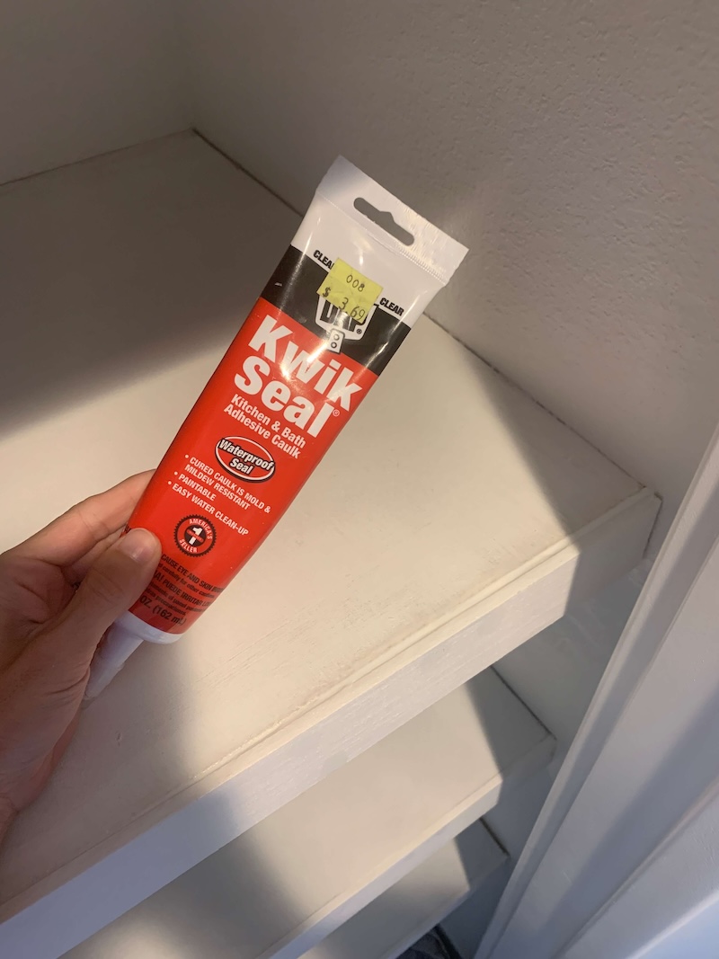 Kwik Seal on DIY closet shelves.