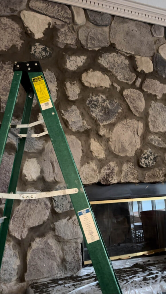 Mortar drying on a stone fireplace.